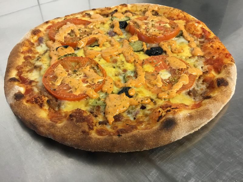 Pizza sortie du four